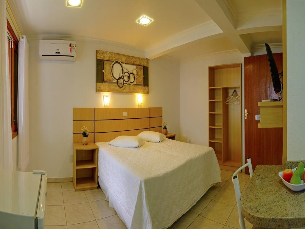 Morada Do Sol Apart Hotel Гаропаба Стая снимка